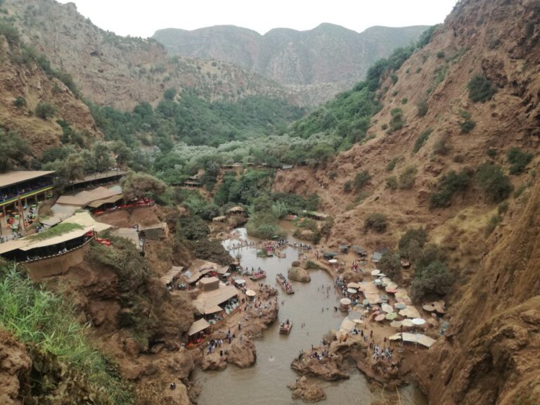 Aerial view of houses beside a lake in the Moroccan countryside