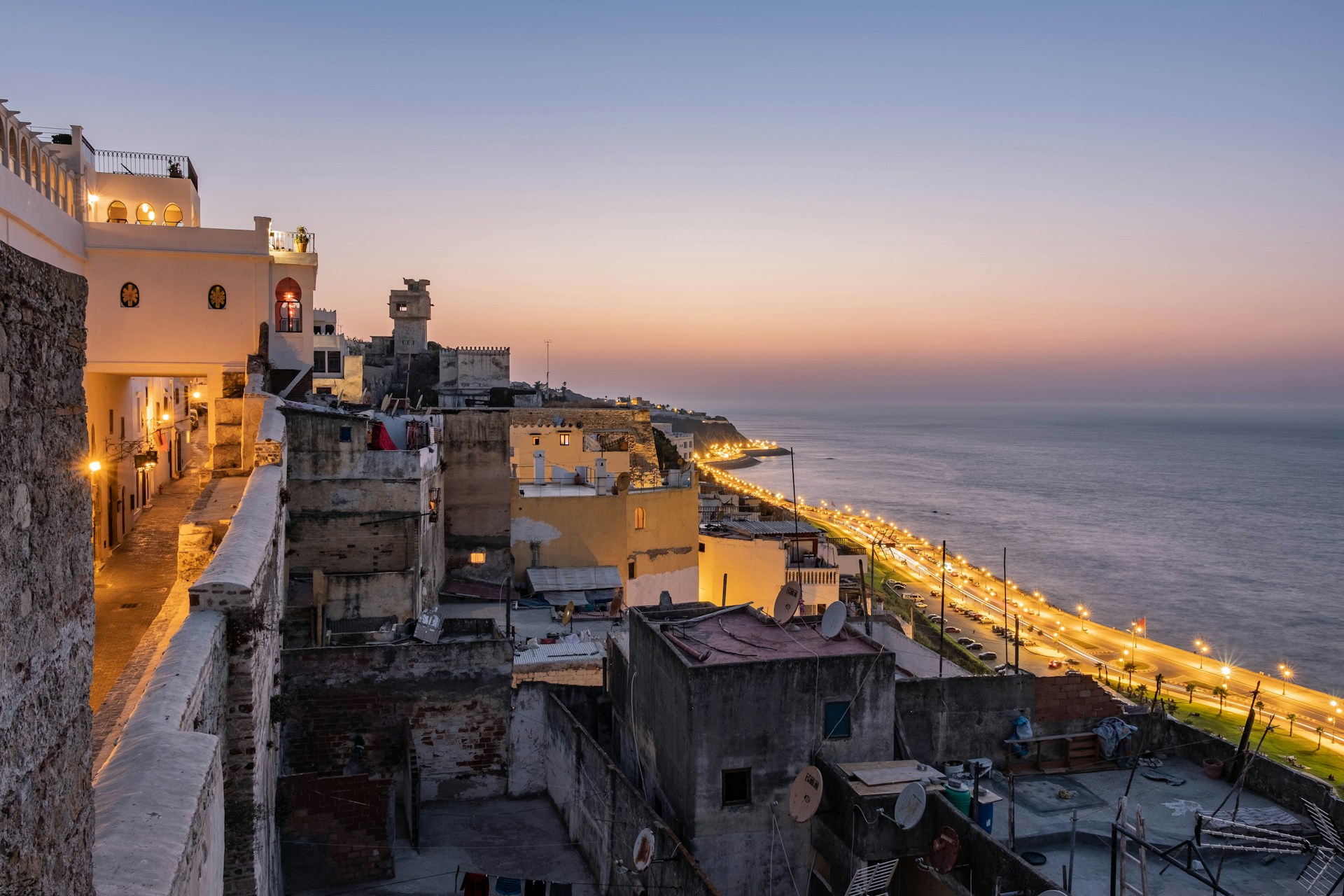 White buildings of Tangier rising above the shoreline